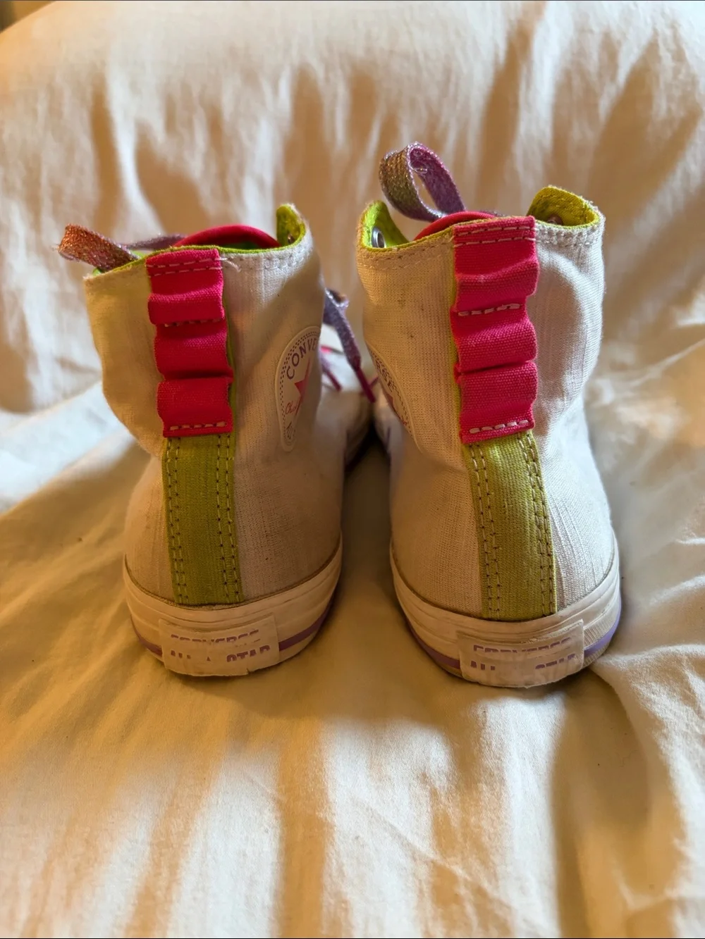 Converse Kids High-Top Sneakers in White with Pink Accents